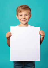 Generative AI, small child, toddler holding a white blank sign in his hands for text, image or advertising, mockup, smiling kid on a colored background with an object, products for children, boy, sale