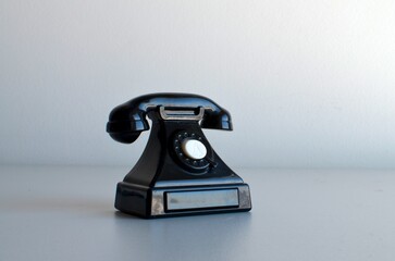 A black old telephone / phone model