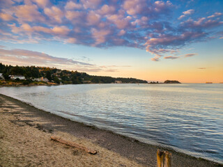 View of sunset at departure bay beach in Nanaimo, during fall season 2023, Vancouver Island, British Colombia, Canada