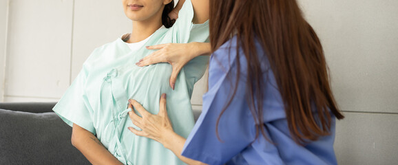 Breast cancer care concept. Young Hispanic adult patient girl in a Breast cancer medical screening...