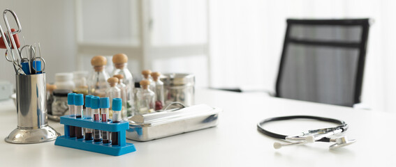 Doctor desk. The physician desktop workspace with relevant equipment. copy space background.