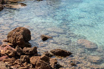 Cala Pregonda is one of those must see special places in Menorca, it is located on the north part of the island.