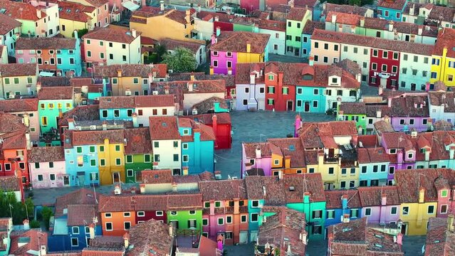 Aerial view of the colorful houses of the Burano Island, in the Venice province of the Veneto region, Italy, sunset