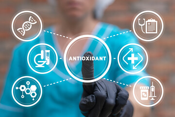 Doctor using virtual touchscreen presses word: ANTIOXIDANT. Natural Antioxidants Nutrition Healthy Eating Diet Treatment Medical Research Innovative Concept.