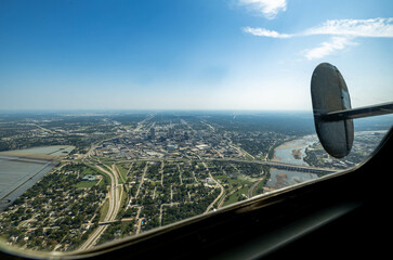looking towards Tulsa, Oklahoma from the right side of a B-24 bomber in flight