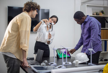 Fototapeta premium Startup team creates portable wind turbine prototype, matching user demand aim for investor funding