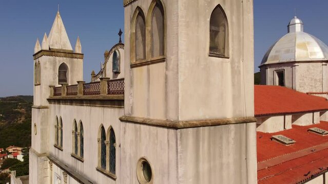 Aerial rising above baroque Santa Maria della Neve church, Cuglieri, Sardinia