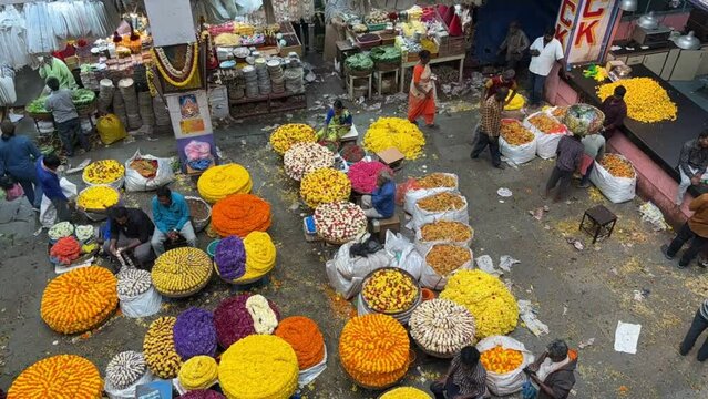 Timelapse of KR Market of flower vendors and people in Bengaluru,India