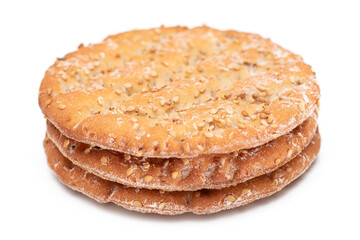 A Stack of Round Salt Crackers with Sesame Isolated on White Background. Dry Snacks - Isolation