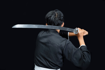 Rear view of a Samurai warrior holding the sword