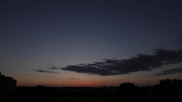 Tokyo, Japan - October 4, 2023: Changing colors of sky at sunrise in Tokyo, Japan
