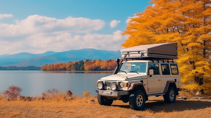4x4 car with rooftop tent at a lake with a view of Mountain Fuji during the autumn Japan. - obrazy, fototapety, plakaty