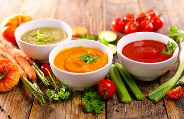 assortment of colored vegetable cream soup