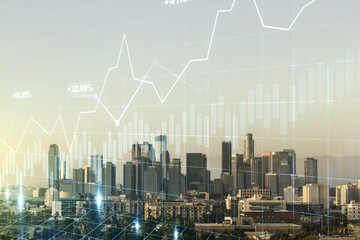 Double exposure of abstract creative financial chart hologram on Los Angeles skyscrapers background, research and strategy concept