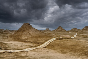 Yardang landforms landscape with storm clouds