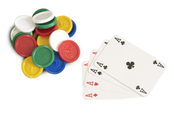 Cenit view of four aces and chips in a poker hand, isolated on transparent background. PNG file.