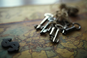 International world management concept.Background with compass, vintage key, vintage tone on ancient world map.