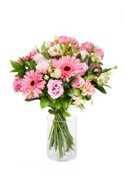 Beautiful huge bouquet of pink gerberas and lisianthus in vase on white background