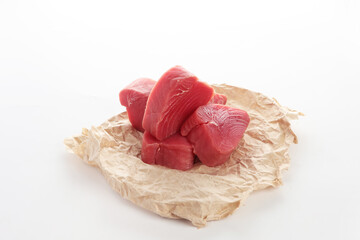 Tuna steaks on white background.Fresh fish. Useful omega. Copy space. Isolated object.