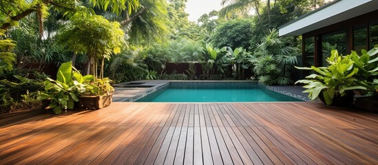 Wooden floor swimming pool in backyard - obrazy, fototapety, plakaty