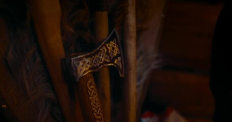 ancient axe with symbols of Slavic, Celtic or Scandinavian culture, closeup view of gun, 4K, Prores