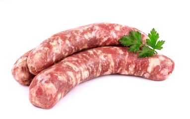 Raw sausage with parsley leaf isolated on white background.