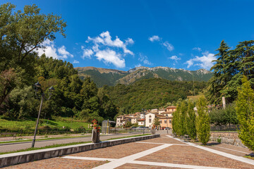 Baldo Mountain (Monte Baldo) in summer, east side, seen from the small village of Ferrara di Monte Baldo, Verona province. Mountain range between Lake Garda and Adige Valley, Italian Alps. Italy, Euro