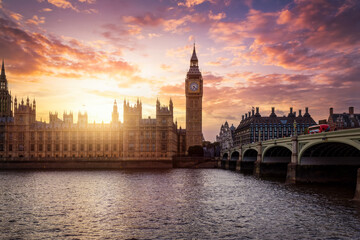 Beautiful sunset view of the Westminster Palace at River Thames and Big Ben clocktower in London,...