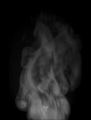 Abstract white puffs of smoke swirl overlay on black background pollution. Royalty high-quality free stock image of abstract smoke overlays on black Vertical backgrounds. White smoke swirls fragments