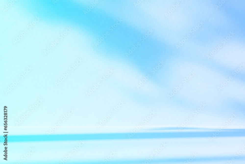 Aufkleber Abstract blue studio background for product presentation. Empty room with shadows of window and flowers and palm leaves . 3d room with copy space. Summer concert. Blurred backdrop.
