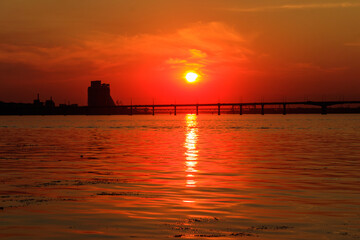 Fototapeta premium Beautiful sunset over the Dnieper river in Dnipro city, Ukraine