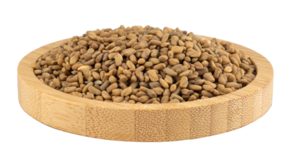 fenugreek grains in a wooden bowl