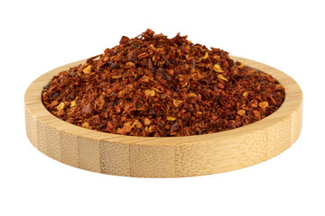 hot red chili pepper in a wooden bowl