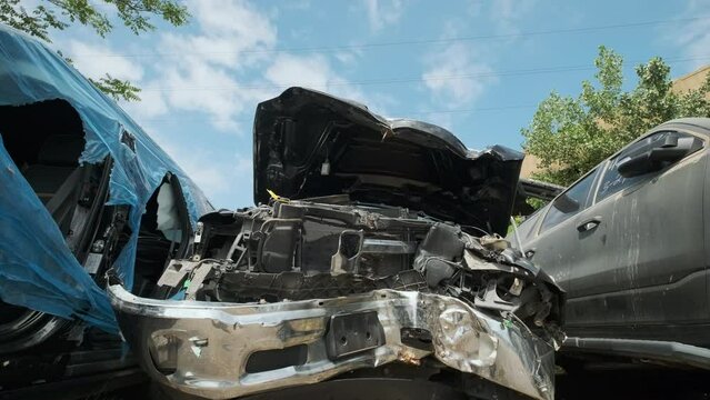 Close up shot of Broken car after an accident damaged in a serious car accident after a collision
