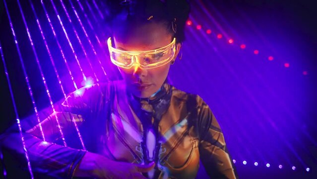 Portrait Fantasy cyborg woman robot costume glowing glasses metal body cyberpunk style hair. Sexy alien girl in virtual reality game lady warrior future vr laser light smoke. Fashion model posing 4k