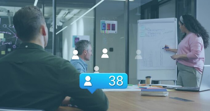 Animation of social media icons and data processing over diverse business people in office