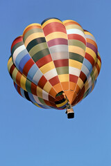multicolored hot air balloon in flight