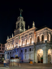 Padua, Italy - October 1, 2023: The Palazzo Comunale dal Liston: the Moretti-Scarpari Wing and the Palazzo degli Anziani with the Torre degli Anziani in the evening - 656380745