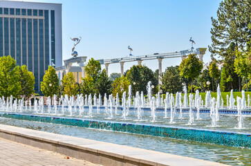 Ezgulik Arch and scenic fountains at Mustakillik maydoni (Independence Square) in Tashkent,...