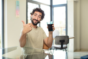 young man with a cola glass