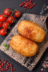 Delicious baked potato cutlet stuffed with chicken and vegetables, spices and salt
