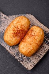 Delicious baked potato cutlet stuffed with chicken and vegetables, spices and salt
