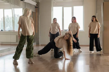 Gordijnen young girls take part in a hip-hop dance battle © Mihail