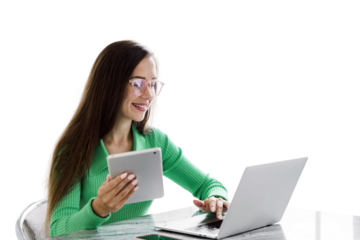 SMM specialist with glasses smart cheerful woman uses a laptop and tablet workplace in the office employee modern business clothes. Transparent isolated background.