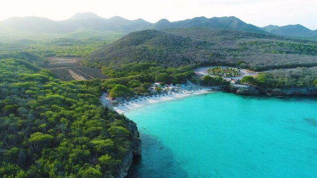 Aerial high angle establish overview above Grote Knip beach Curacao, view from ocean to land