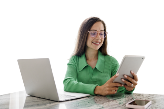 A copywriter with glasses smart cheerful woman uses a laptop and tablet workplace in the office employee modern business clothes. Transparent isolated background.