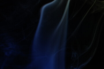 Yellow and blue smoke on a dark background, colourful abstract, one line, minimalistic art	