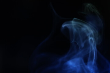 Yellow and blue smoke on a dark background, colourful abstract, one line, minimalistic art	
