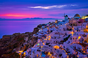 Oia village, windmills, Santorini island, Greece at colorful sunset - obrazy, fototapety, plakaty