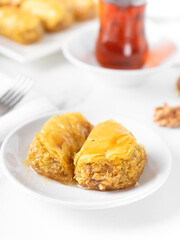 Pistachio baklava. Close-up baklava isolated on white background. Mediterranean cuisine delicacies